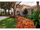 Beautiful clubhouse exterior showcases manicured landscaping and welcoming architectural design at 244 Dove Trl, Bradenton, FL 34212