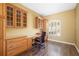 Office featuring built-in cabinets, desk, and natural light from the window at 244 Dove Trl, Bradenton, FL 34212