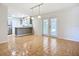 Open floor plan with tiled floors offers great flow to the renovated kitchen with a breakfast bar and stainless steel appliances at 2705 21St W Ave, Bradenton, FL 34205