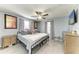 Serene bedroom with soft blue walls, natural light, and cozy furnishings creates a relaxing atmosphere at 3119 40Th W Ave, Bradenton, FL 34205