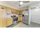 Efficient kitchen design with stainless steel appliances and practical tile flooring at 3119 40Th W Ave, Bradenton, FL 34205