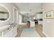 Open-concept living space showcasing a kitchen with an island and a comfortable living area at 412 73Rd St, Holmes Beach, FL 34217