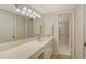 Clean bathroom with vanity and ample lighting at 4350 Chatham Dr # E-105, Longboat Key, FL 34228