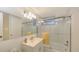 Bathroom with glass enclosed tub at 4350 Chatham Dr # E-105, Longboat Key, FL 34228