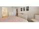 Bedroom with dresser and view into hall at 4350 Chatham Dr # E-105, Longboat Key, FL 34228