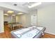 Bright game room with an air hockey table, ping pong table and foosball at 4350 Chatham Dr # E-105, Longboat Key, FL 34228