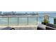 Expansive balcony with stunning views of the city and the water, perfect for relaxing or entertaining at 464 Golden Gate Pt # 702, Sarasota, FL 34236
