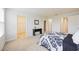 Bedroom featuring access to a walk-in closet and Primary bathroom at 4781 Vignette Way, Sarasota, FL 34240