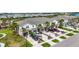 Beautiful exterior view of townhomes with lush landscaping and private driveways at 4781 Vignette Way, Sarasota, FL 34240
