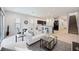 Spacious living area with an open layout connecting to the kitchen and dining area at 4781 Vignette Way, Sarasota, FL 34240
