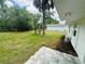 Backyard featuring a patio and lush landscaping at 4823 Linwood St, Sarasota, FL 34232