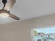 Bedroom featuring a ceiling fan, natural light, and neutral color palette at 4823 Linwood St, Sarasota, FL 34232