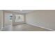 Bright living room showcasing light walls, light floors, front door, and natural light at 4823 Linwood St, Sarasota, FL 34232