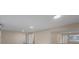 Open living room featuring light floors, recessed lights, light walls, and access to other rooms at 4823 Linwood St, Sarasota, FL 34232