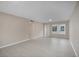 Bright living room featuring light walls, light floors, front door, and natural light at 4823 Linwood St, Sarasota, FL 34232
