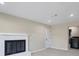 A bright living room is shown featuring a white brick fireplace and modern smooth floors at 4823 Linwood St, Sarasota, FL 34232