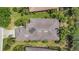 Aerial view of the home showcasing the roof and surrounding lush landscaping at 5009 Lake Overlook Ave, Bradenton, FL 34208