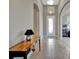 Welcoming entryway features tile flooring, arched doorways, and a bright, airy atmosphere at 5009 Lake Overlook Ave, Bradenton, FL 34208
