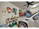 Well-organized two car garage with ample shelving and storage solutions at 5009 Lake Overlook Ave, Bradenton, FL 34208