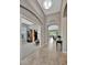 Inviting foyer features tile flooring and a view into multiple rooms at 5009 Lake Overlook Ave, Bradenton, FL 34208