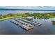 Aerial view of the boat docks and marina with covered pavilion on the water for community members at 5009 Lake Overlook Ave, Bradenton, FL 34208