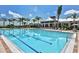 Large community pool with ample lounge seating and a covered pavilion for shade and relaxation at 5009 Lake Overlook Ave, Bradenton, FL 34208