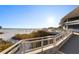 Elevated view from a patio overlooking the pristine beach, providing a serene setting for relaxation and enjoyment at 5134 Northridge Rd # 106, Sarasota, FL 34238