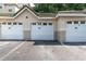Exterior view of the reserved garage spaces at this condo complex at 5134 Northridge Rd # 106, Sarasota, FL 34238