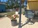 Backyard deck area with outdoor seating and landscaping at 534 Lewis St, Englewood, FL 34223