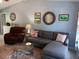 Cozy living room with comfortable seating, stylish decor, and ample natural light at 534 Lewis St, Englewood, FL 34223
