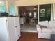 Bright sunroom opens to the main living room, creating a seamless and inviting space at 534 Lewis St, Englewood, FL 34223