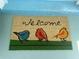 Close up of a welcome mat with a bird design at 534 Lewis St, Englewood, FL 34223