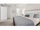 Cozy bedroom with comfortable bed, soft carpet, and easy access to ensuite bathroom and closet at 5520 Coachwood Cv, Bradenton, FL 34211