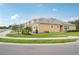 Lovely home showcases pristine lawn care, a neutral exterior, and a sidewalk at 5520 Coachwood Cv, Bradenton, FL 34211