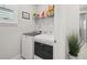 Laundry room with new front load washer and dryer at 5520 Coachwood Cv, Bradenton, FL 34211