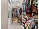 Walk-in closet with organized storage for clothing and accessories at 5637 Arnie Loop, Bradenton, FL 34211