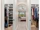 Walk-in closet that leads into a bedroom with natural light at 5637 Arnie Loop, Bradenton, FL 34211