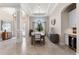 A modern dining room featuring elegant decor, a large window, and a beverage center at 5637 Arnie Loop, Bradenton, FL 34211