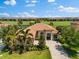 Beautiful single-story home with tile roof, well-manicured lawn, landscaping and proximity to the golf course at 5637 Arnie Loop, Bradenton, FL 34211