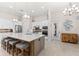 Spacious kitchen with a large center island, stainless steel appliances, and ample counter space at 5637 Arnie Loop, Bradenton, FL 34211