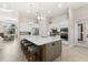 Bright kitchen with a large center island and views of the dining area at 5637 Arnie Loop, Bradenton, FL 34211