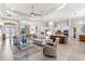Spacious living room with an open floor plan and seamless flow to the kitchen at 5637 Arnie Loop, Bradenton, FL 34211
