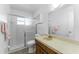 Bathroom featuring a tiled shower and vanity with counter space at 6087 Coral Way, Bradenton, FL 34207