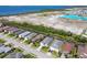 Aerial view of beautiful homes by a lagoon and the ocean at 6228 Champions Row St, Bradenton, FL 34210