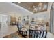Spacious living room connects to dining area and kitchen, perfect for entertaining guests at 6228 Champions Row St, Bradenton, FL 34210