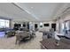 Spacious common room featuring multiple seating areas, tables, and a modern kitchen for community gatherings at 6308 Plateau Ct, Bradenton, FL 34203