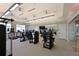 Well-equipped gym featuring state-of-the-art machines, free weights, and mirrors for a complete workout experience at 6308 Plateau Ct, Bradenton, FL 34203