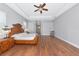 Spacious bedroom features wood floors, tray ceiling, and large open space at 6407 213Th E St, Bradenton, FL 34211
