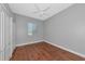 Bright bedroom features laminate floors, closet storage, and neutral paint at 6407 213Th E St, Bradenton, FL 34211