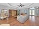 Inviting living room features a large sectional sofa and stylish decor, creating a cozy atmosphere at 6407 213Th E St, Bradenton, FL 34211